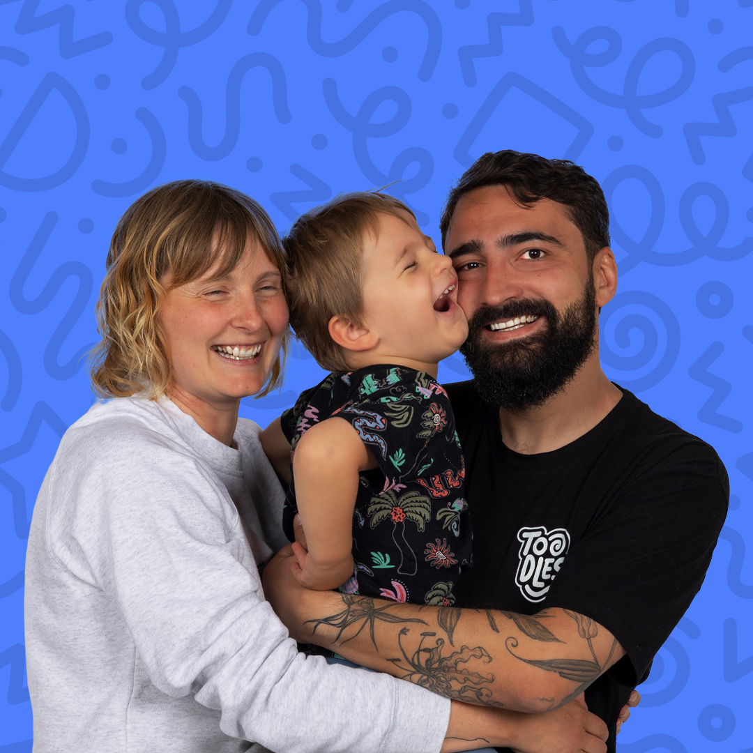 Caio and Katherine, founders of Toodles, with their son